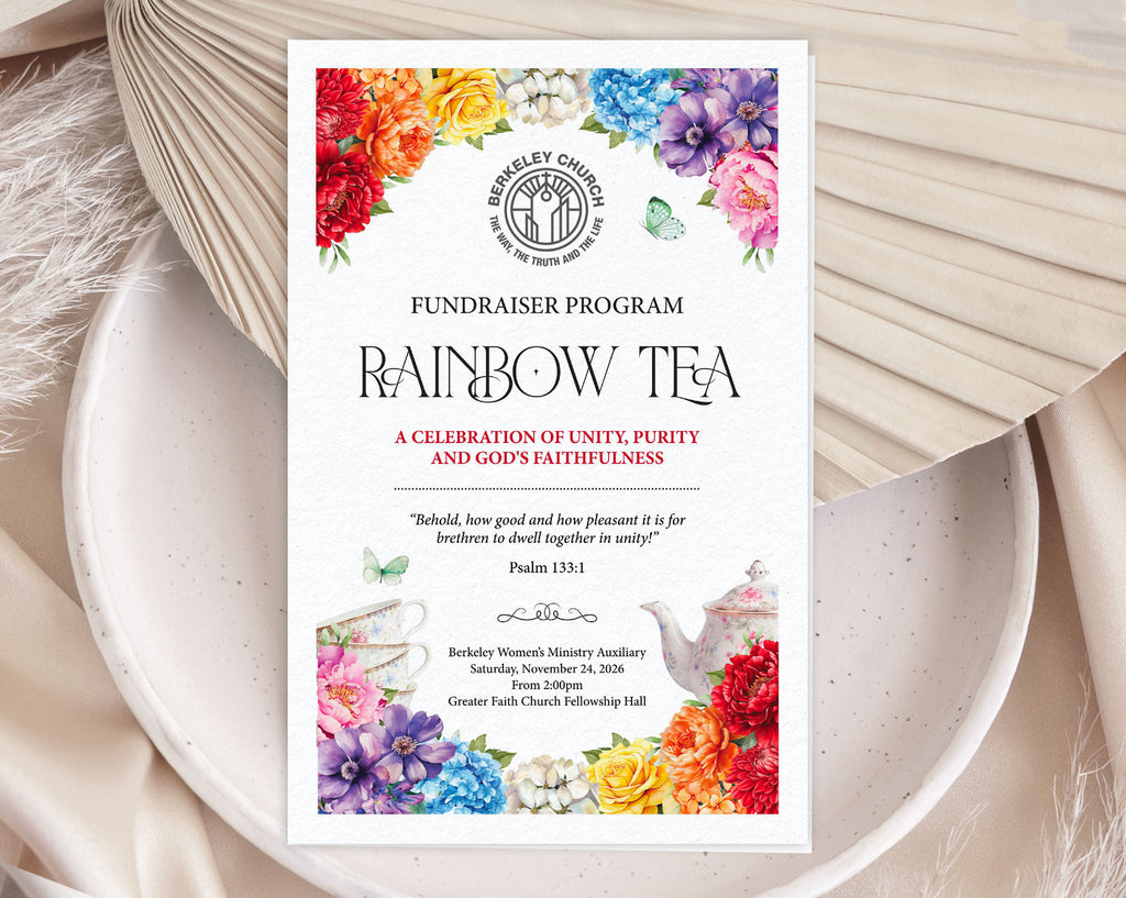 A printed fundraiser folded 11 x 8.5 program card for 'Rainbow Tea' church event styled flat-lay on a ceramic dish with dried flowers.