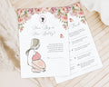 2 blush pink flower baby shower game cards laying on a wooden background next to a cloth and some dried plants
