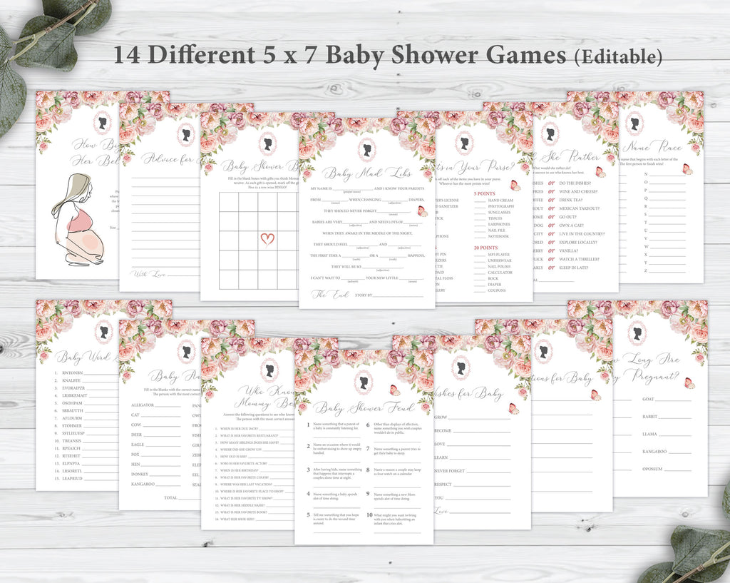 14 different blush pink baby shower game cards in two rows laying on a grey wooden background next to some eucalyptus leaves