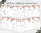 14 different blush pink baby shower game cards in two rows laying on a grey wooden background next to some eucalyptus leaves