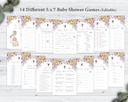 14 different baby shower game cards in two rows laying on a grey wooden background next to some eucalyptus leaves