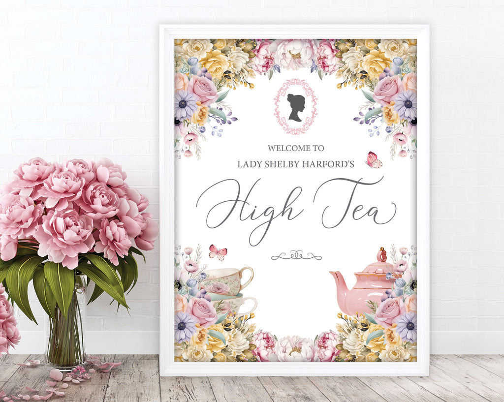 Decorative high tea greeting sign with floral design, cameo and teapot illustration on a white wall.