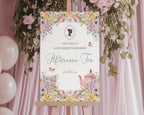 elegant pastel welcome sign for an afternoon tea event with bridgerton-inspired cameo, on an easel in front of a pink backdrop with pink balloons.