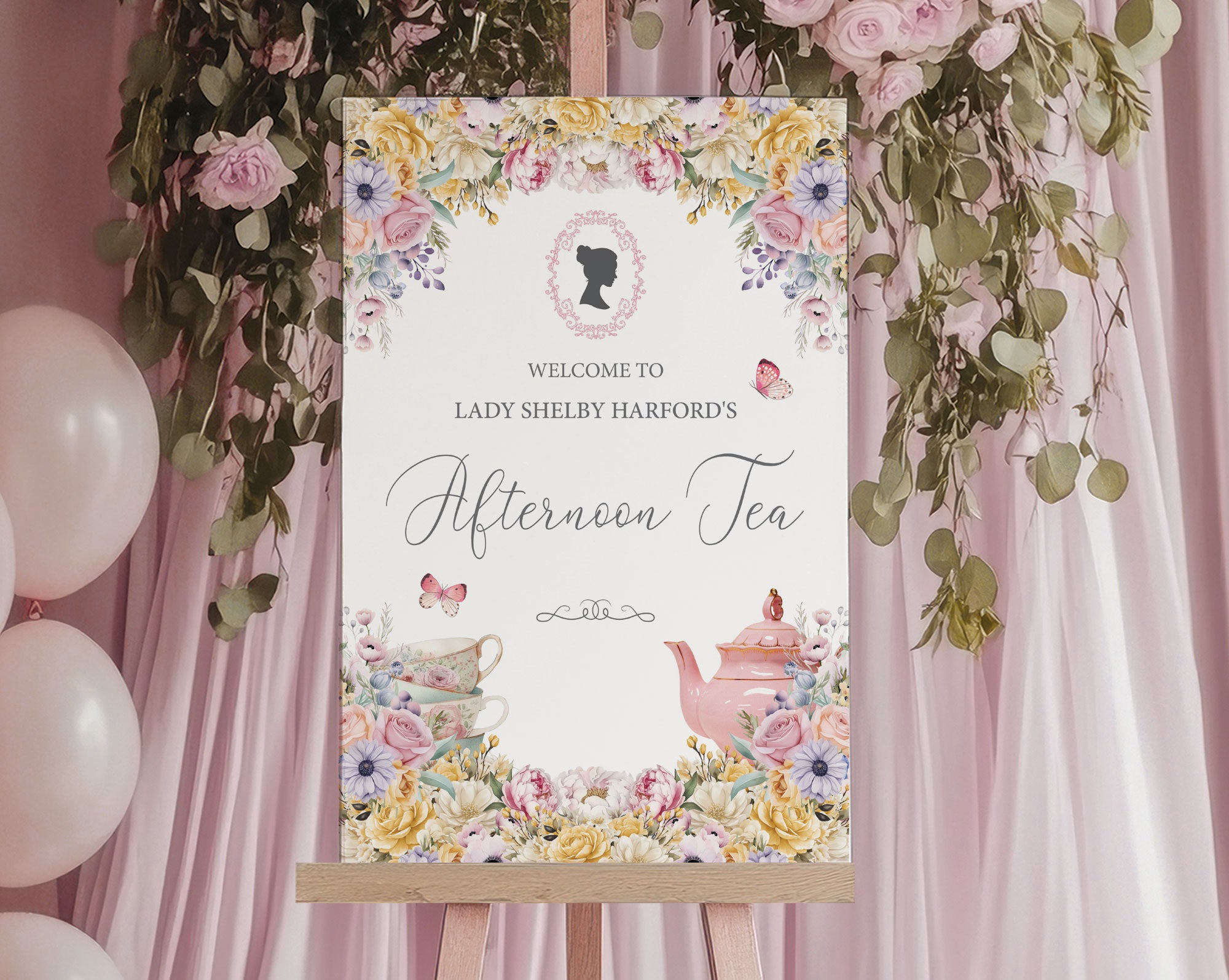 elegant pastel welcome sign for an afternoon tea event with bridgerton-inspired cameo, on an easel in front of a pink backdrop with pink balloons.