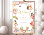 24 x 36 fairy garden welcome sign in a wooden frame on an easel with a window with white curtains and white balloons in the background