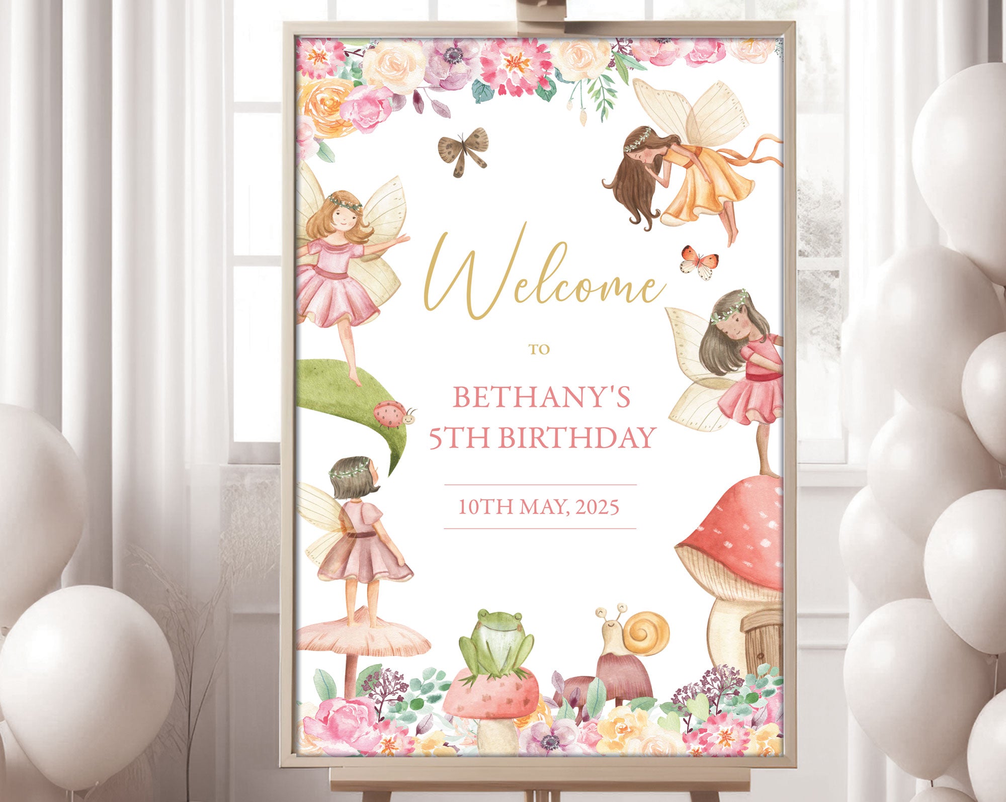 24 x 36 fairy garden welcome sign in a wooden frame on an easel with a window with white curtains and white balloons in the background