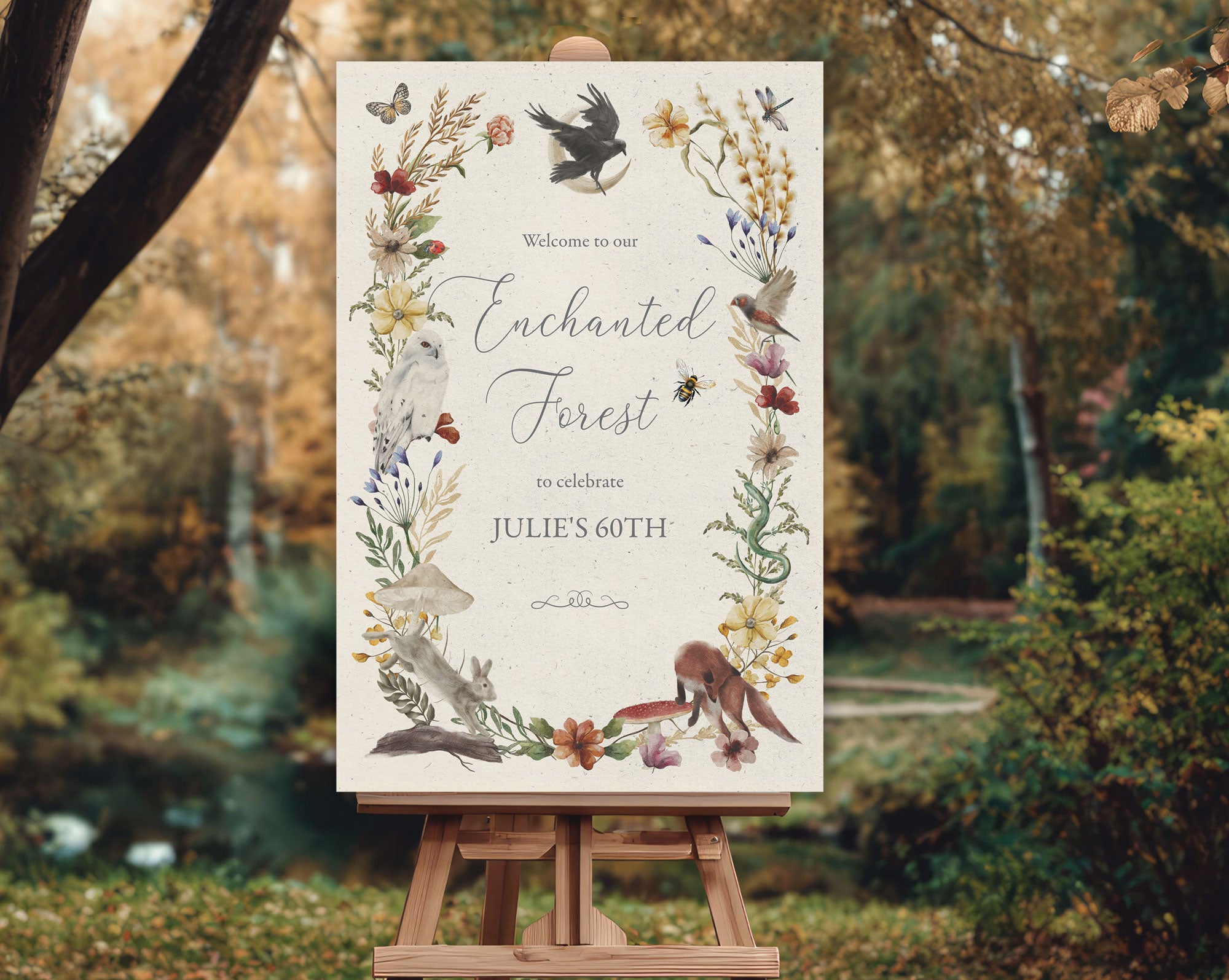 pretty enchanted forest welcome sign 24 x 36 size on a wooden easel outside in front of a forest setting