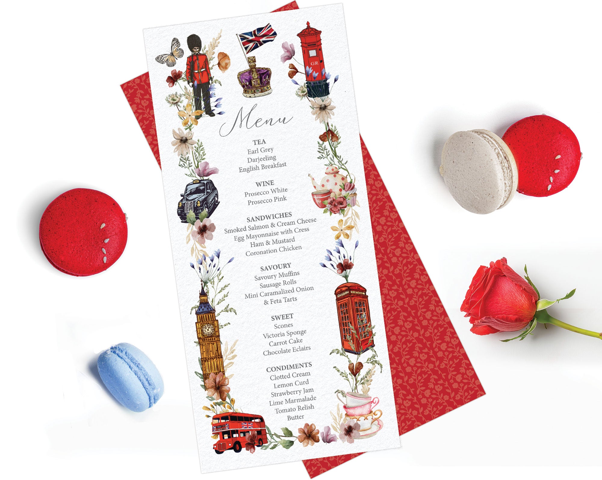 red and black british tea party menu for an afternoon tea, laying on a white background with red and blue macarons and a red rose next to it