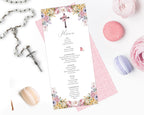 a pastel flower church ladies tea menu with a floral cross lying on a white background next to a rosary and macarons