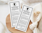 two 'Lady Whistledown's Society Bachelorette Party Announcement Papers' on a wooden surface with a white fabric background.