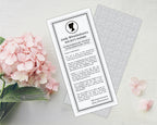 elegant regency society page for a graduation showing pattern back on a grey background next to some pink hydrangeas