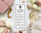 elegant regency bridgerton-inspired society note for a graduation, next to a pink graduation cap, pink and cream flowers and Class of 2026 year book