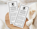 two 'Lady Whistledown's Society Birthday Announcement Papers' on a wooden surface with a white fabric background.