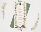 a pretty enchanted forest dinner menu with various woodland animals and bird graphics laying on the green menu back on a white background