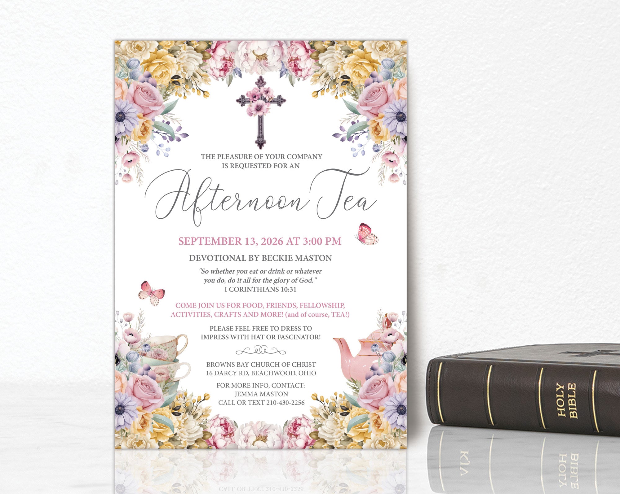 Invitation card for an afternoon tea religious church event with pastel floral design on a white background next to a bible