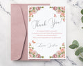 Floral thank you card with pink envelope on a marble surface