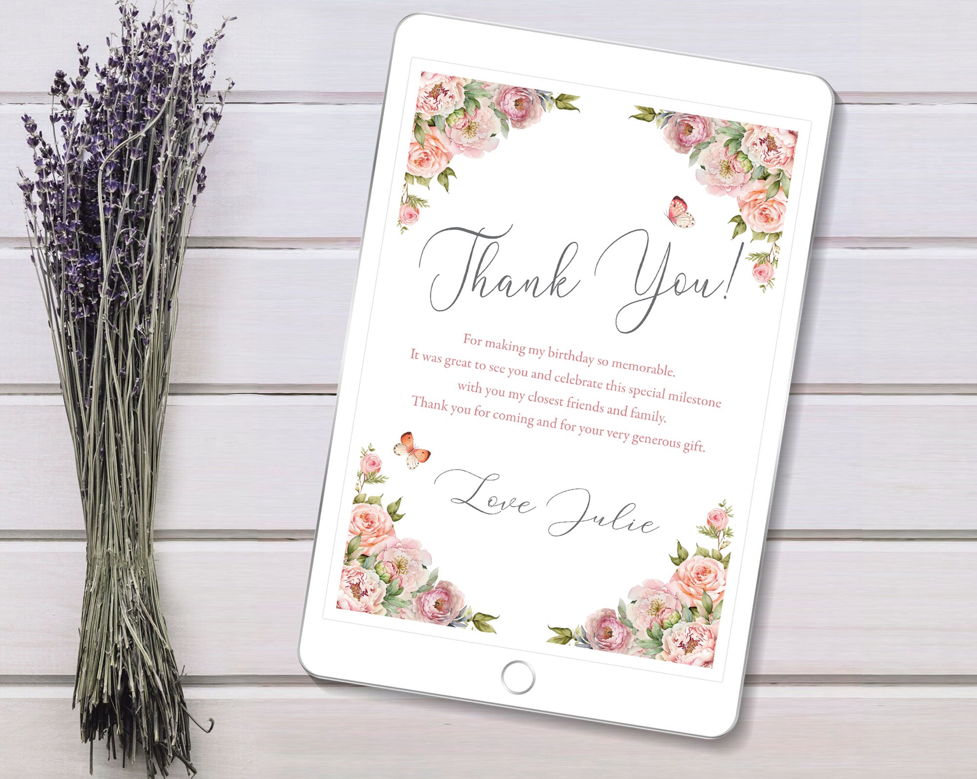 Floral 'Thank You' card on a digital device with lavender on a wooden background