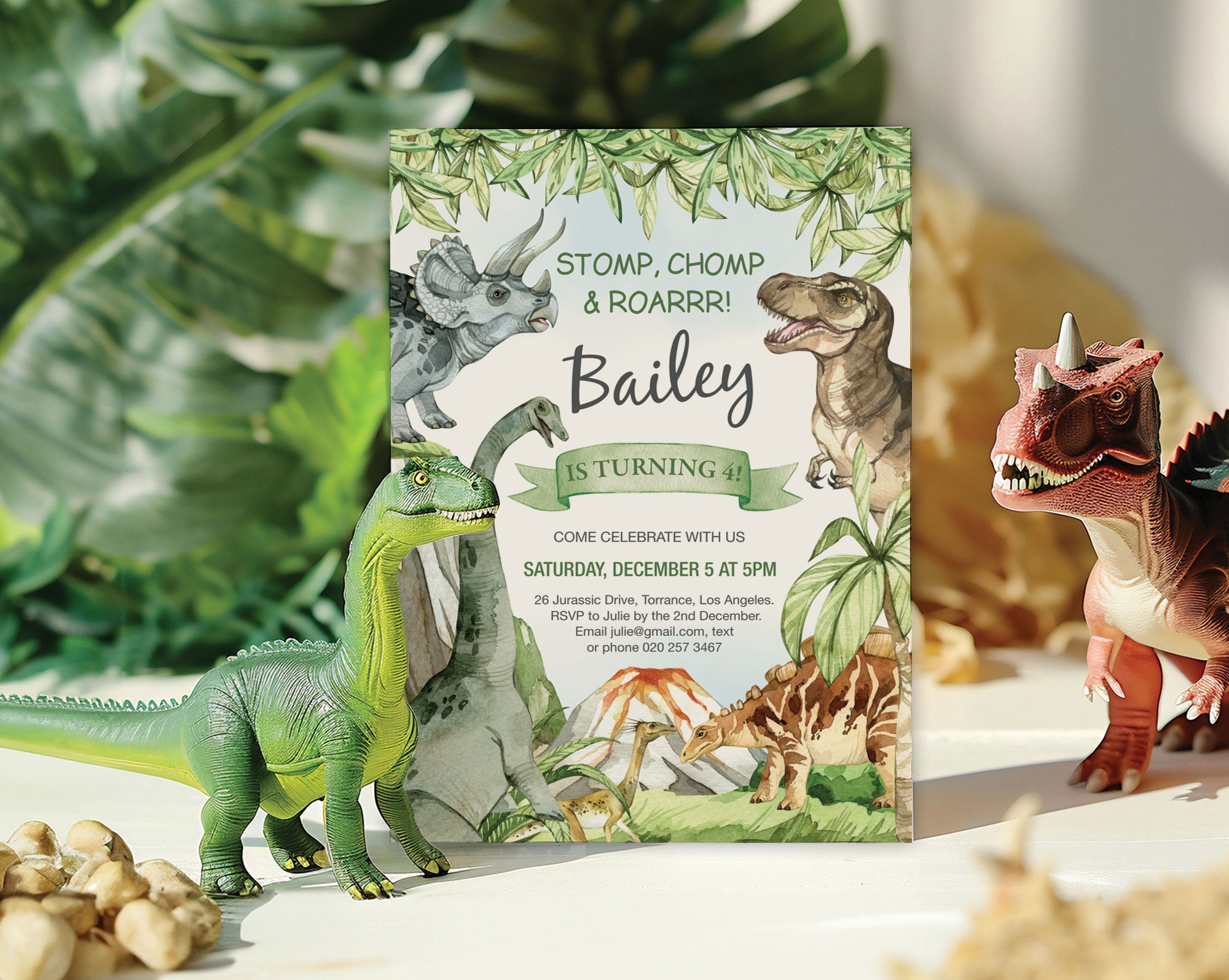 Dinosaur-themed birthday invitation with toy dinosaurs and a leafy background