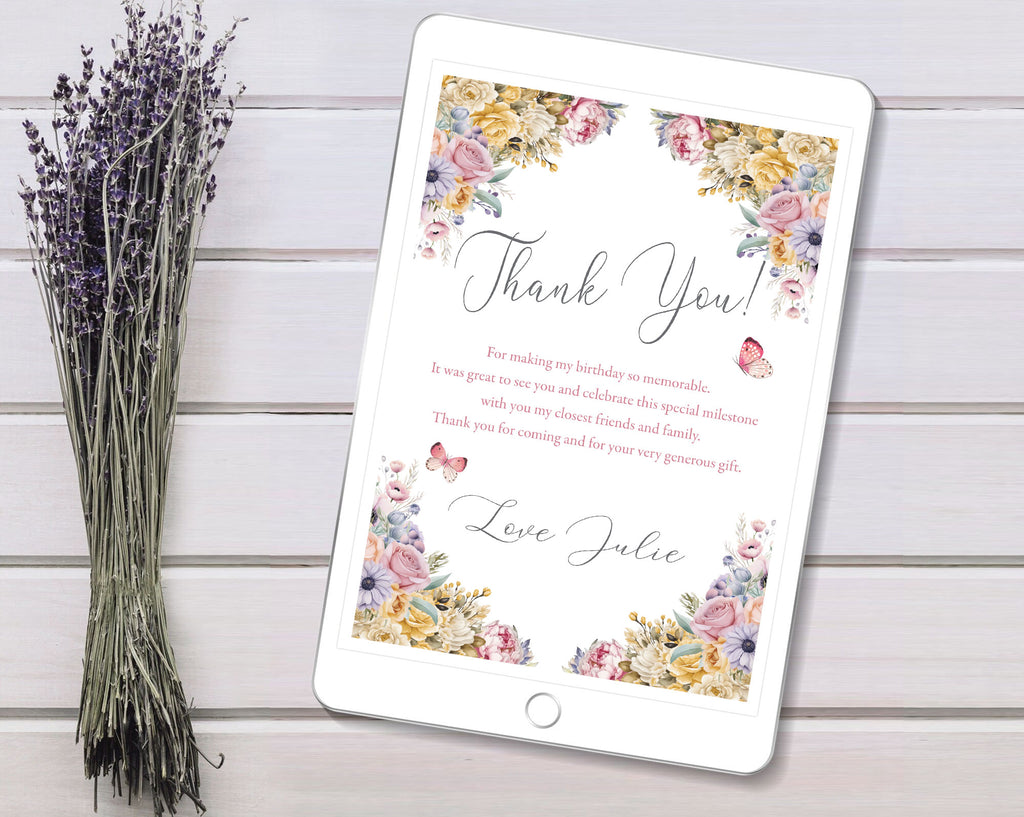 Floral 'Thank You' card on a tablet with lavender on a wooden surface