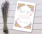Floral 'Thank You' card on a tablet with lavender on a wooden surface