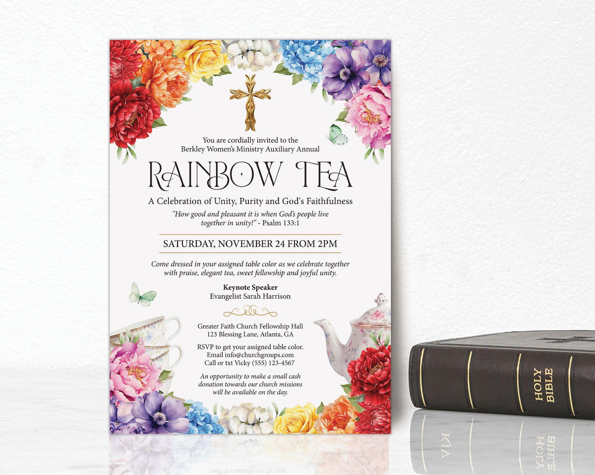 bright invitation for a church rainbow tea event with bright flowers, qcode, teapot and scripture leaning up against a wall next to a black bible