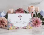 pretty church thanks folded Card with floral design and cross in front of flowers on a marble surface