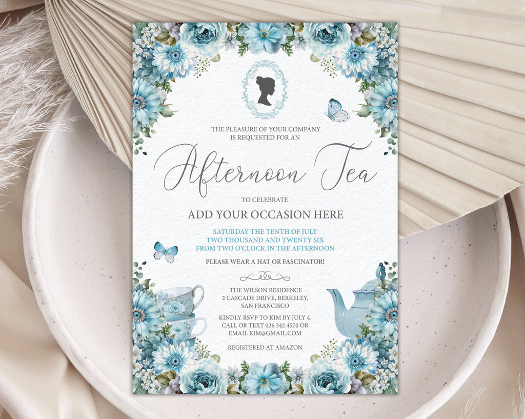 dusty blue Invitation card for an afternoon tea event with floral design, cameo and teapot on a textured surface