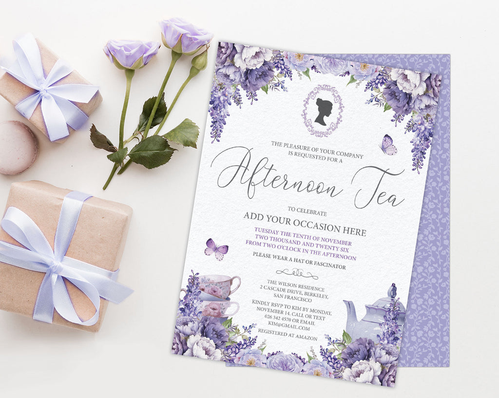 A flat-lay of a lavender and purple floral invitation card for an after tea event, styled with two wrapped gift boxes and two purple roses on a white background.