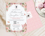 mother and daughter tea room event invitation with back and logo showing laying on a wooden background next to a plate of macarons
