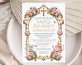 Pretty church ladies tea party invitation with gold frame, christian cross and teapot graphics laying on a white plate with a dried leaf in the background