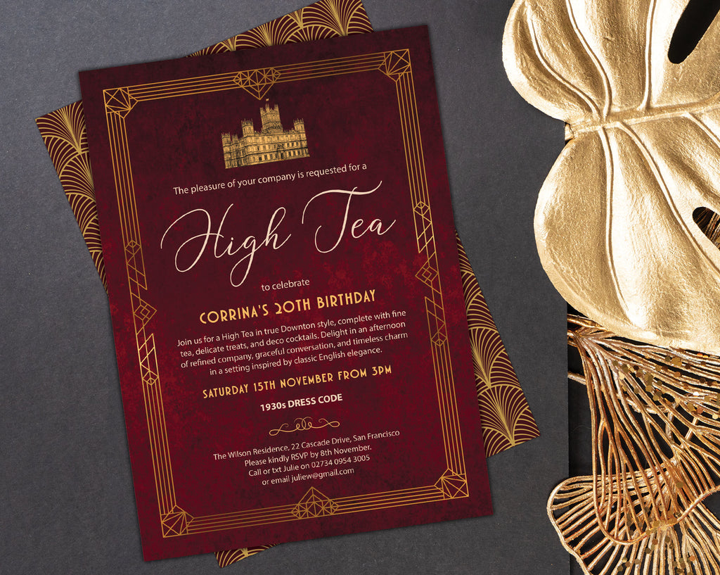 elegant art deco high tea gold and burgundy invitation with gold and red pattern back on a dark grey background with gold leaf and decor
