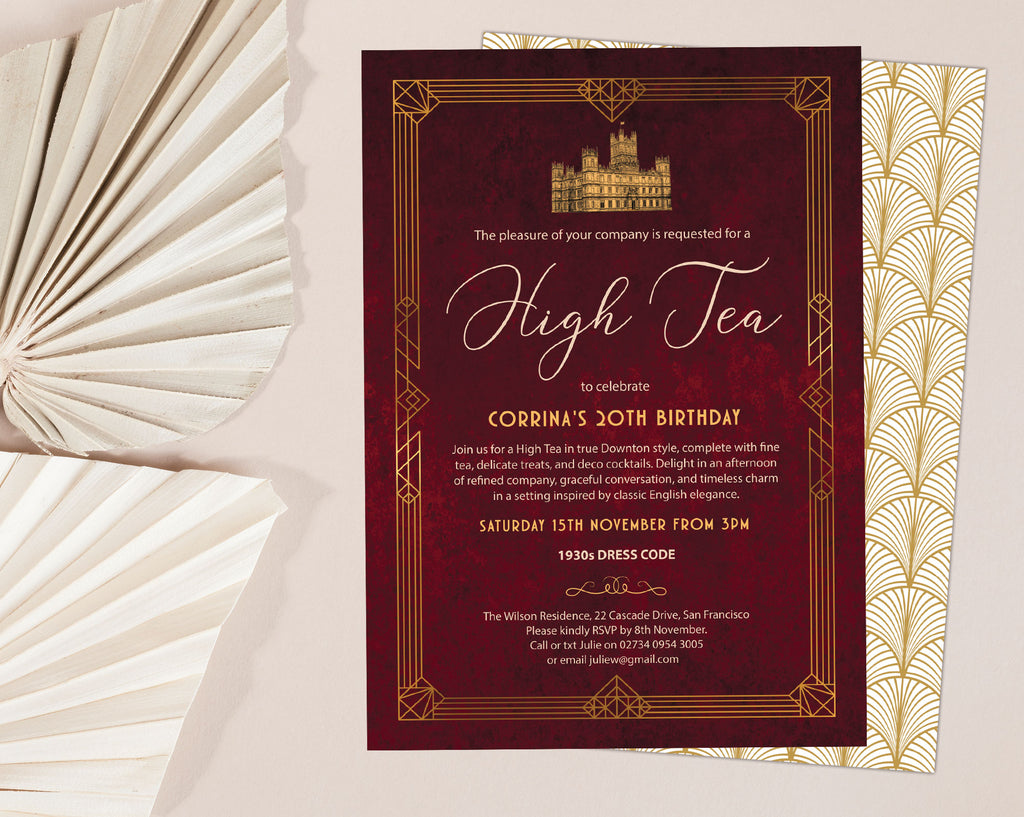 downton abbey inspired high tea invitation with hyclere house, gold border and art deco pattern back laying on a beige background with dried leaves