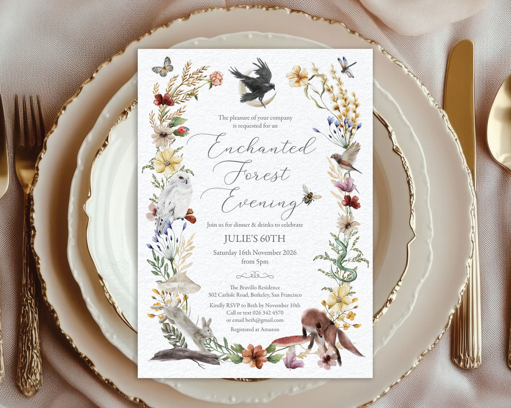 an elegant place setting with cream and gold plates and cutlery with an enchanted forest dinner invitation sitting on top
