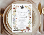 an elegant place setting with cream and gold plates and cutlery with an enchanted forest dinner invitation sitting on top