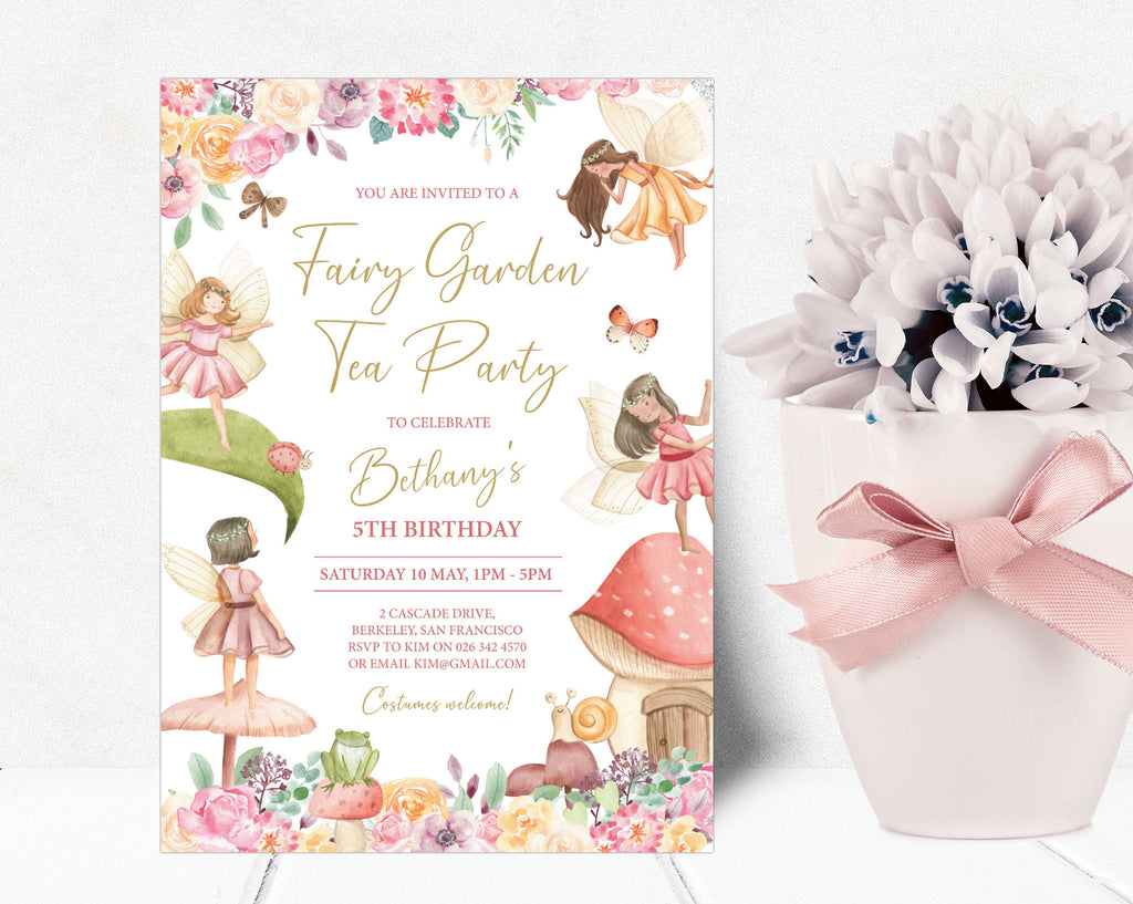 a fairy garden birthday invitation leaning up against a white wall next to a white plant and pot wrapped with pretty pink ribbon