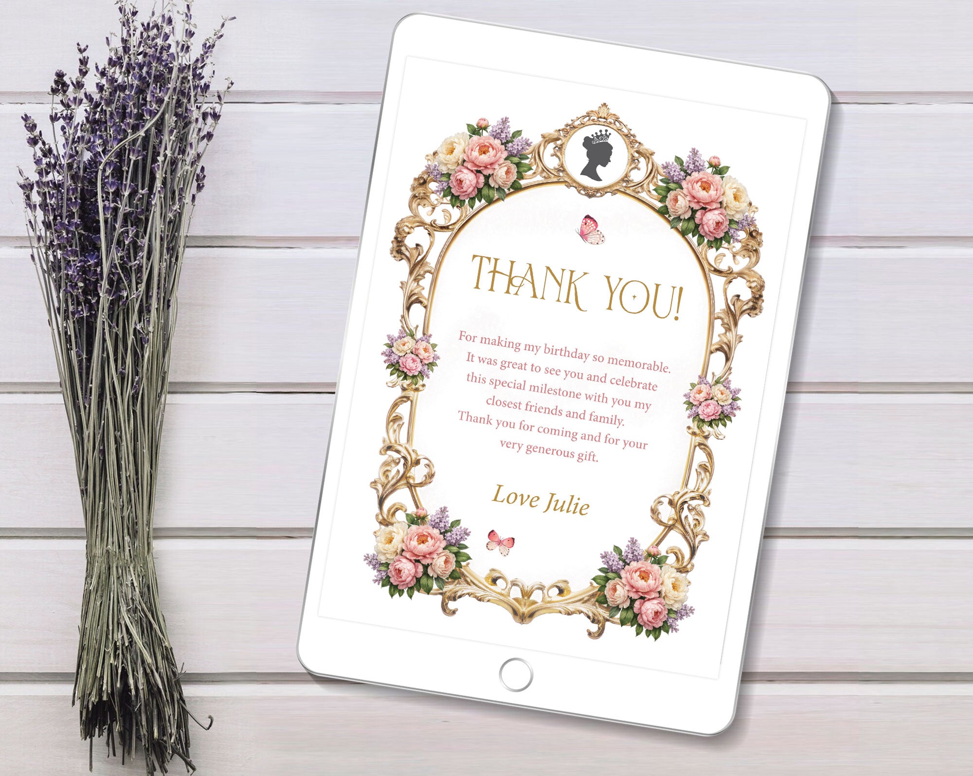 thank you note showing on an ipad laying on a white background with dried flowers