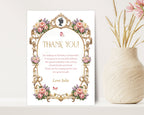 pretty pastel flower 5 x 7 or 4 x 6 thank you note, with gold frame, leaning up against a wall next to a vase of dried pink flowers