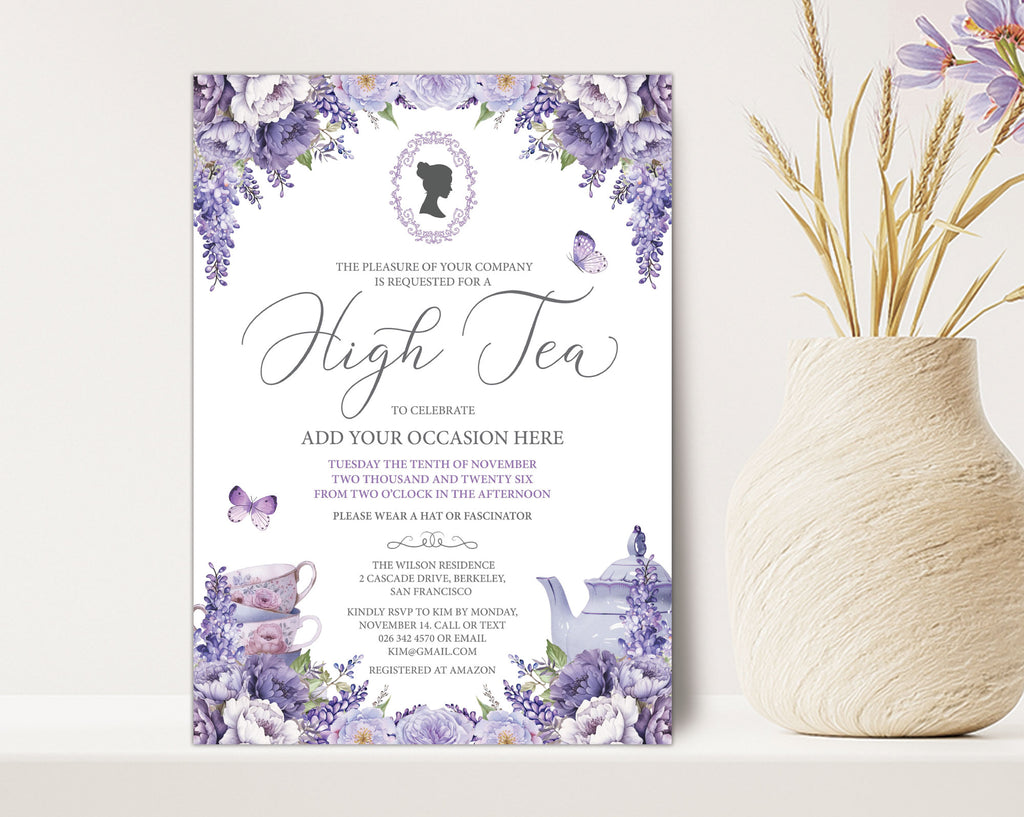 a pretty lavender colored tea party invitation leaning up against a beige wall next to a vase of dried flowers