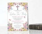 Pretty pink bible ladies tea invitation for a church tea leaning up against a white wall next to a bible