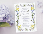 an elegant bridal shower luncheon invitation with wildflowers, butterfly, bee and dragonfly laying on a light grey background next to a lilac hydrangea flower
