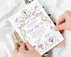 royal high tea for a princess Invitation card with decorative elements held by hands on a light fabric background