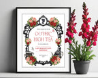 a black frame containing an 8 x 10 gothic high tea welcome sign with regency style cameo, teapot and tea cups next to some red flowers in a pot