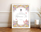 A1 pastel welcome sign  for an afternoon tea event with cameo, butterflies and teapot, framed  and leaning against a white wall