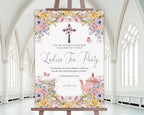A1 christian church ladies tea party welcome sign on an easel with a white church hall in the background