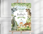 A1 dinosaur welcome sign for a kids party on an easel in front of a white panel wall