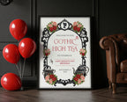 victorian gothic high tea party sign in a frame leaning up against a black wall next to some red balloons