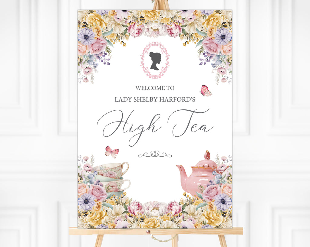 High Tea welcome sign on an easel with lady cameo, pink teapot and butterflies