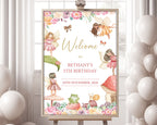 An A1 fairy welcome sign in a wooden frame on an easel with a white wall with window and white balloons in the background