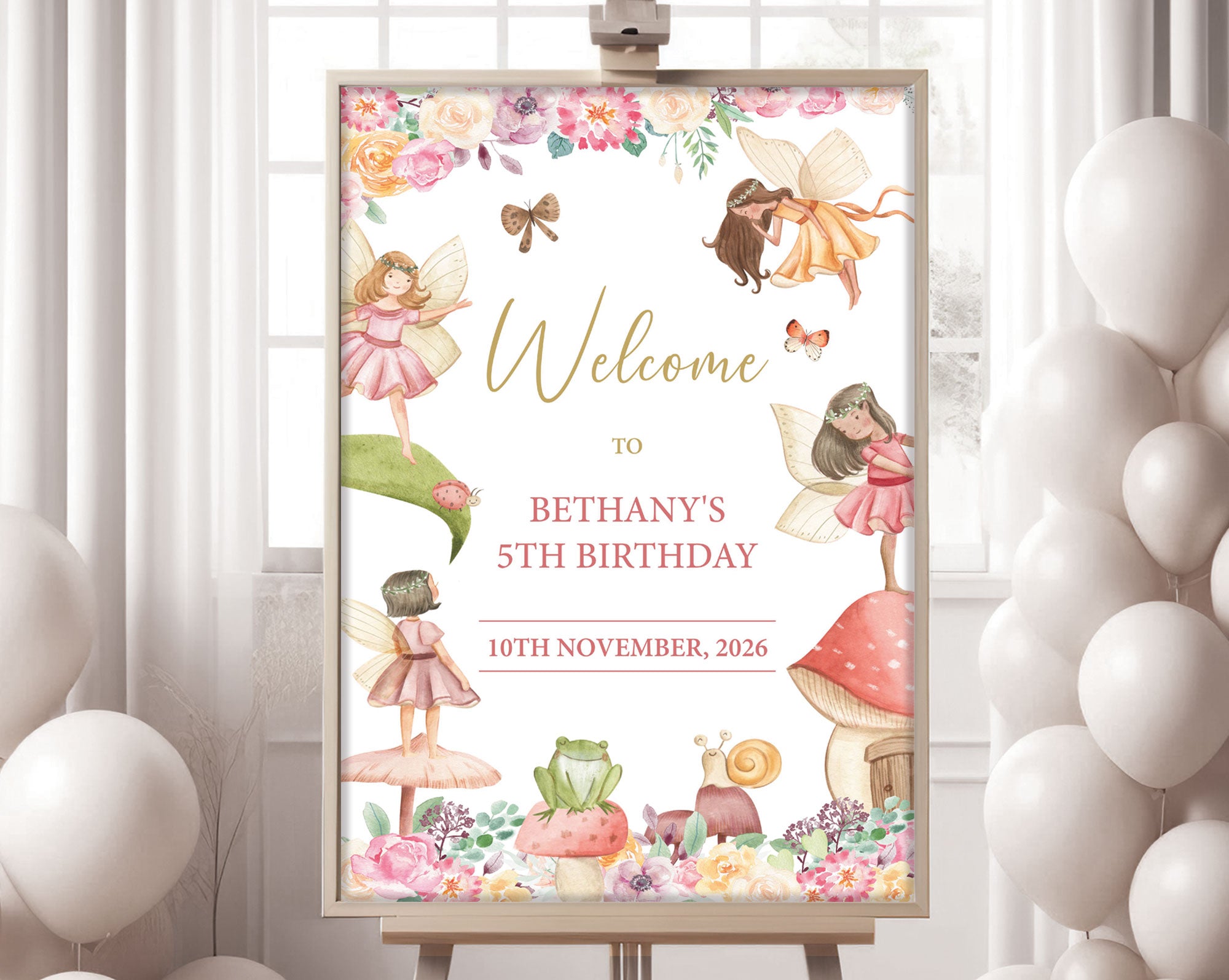 An A1 fairy welcome sign in a wooden frame on an easel with a white wall with window and white balloons in the background