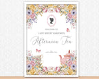 an A2 welcome sign for an afternoon tea event with floral decorations and a teapot in a white frame leaning up against some white patterned wallpaper